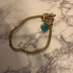 Gold designer charm bracelet